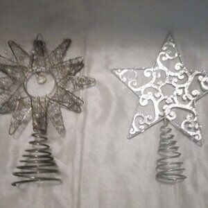 2 faux silver tree spiral topping Christmas in July decorative event